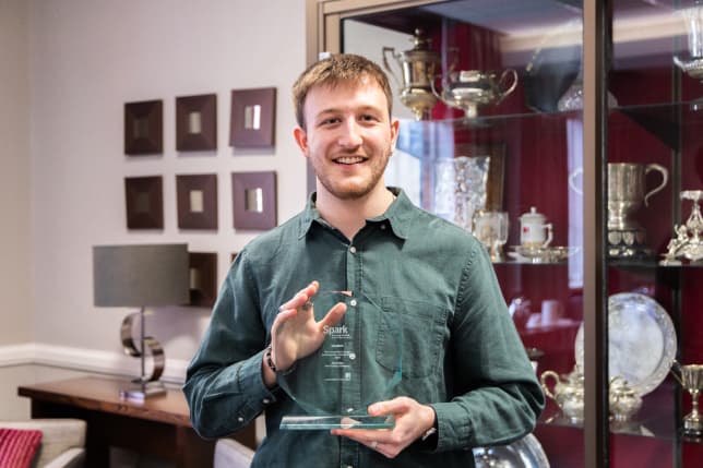 Tom Milner receiving award